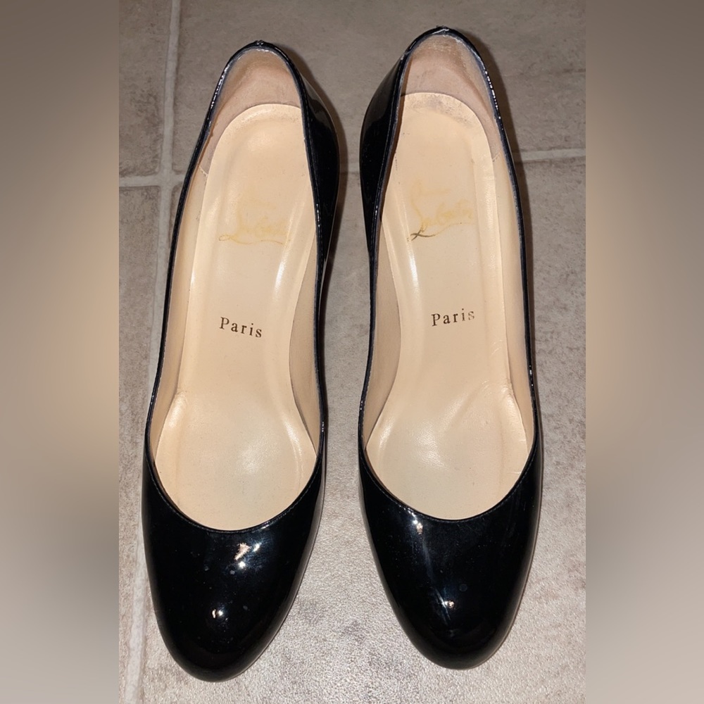 Black Louboutin shoes